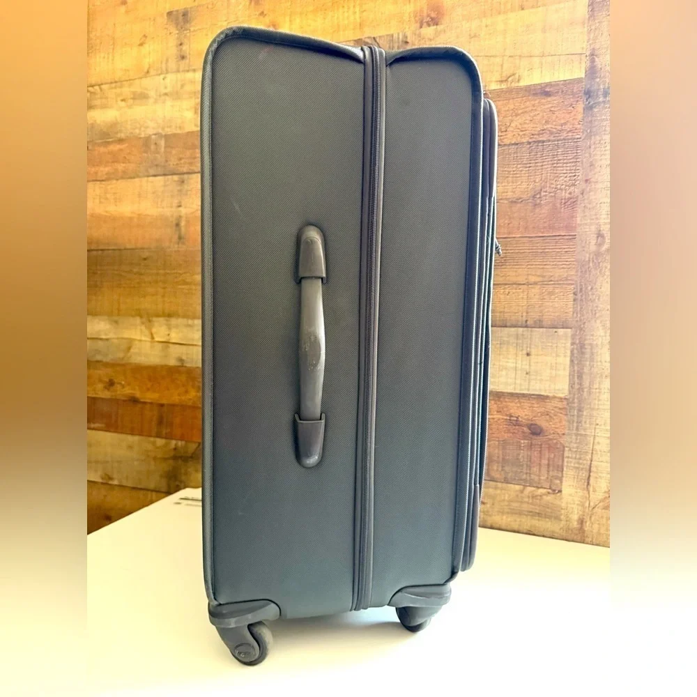 Tumi Alpha Expandable 4 Wheeled Carry-On